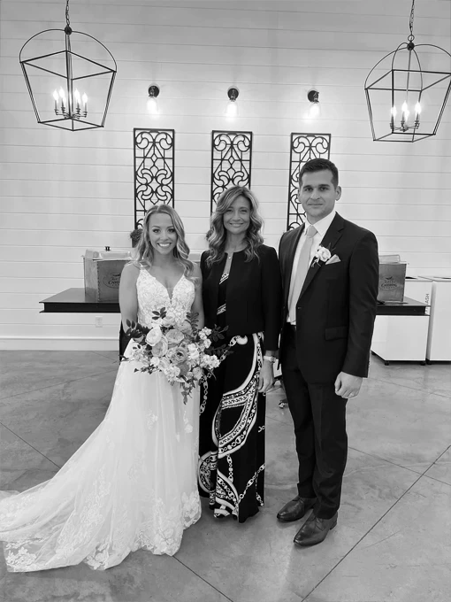 a couple with wedding planner, Bretta Thompson at their No Ceremony Marriage